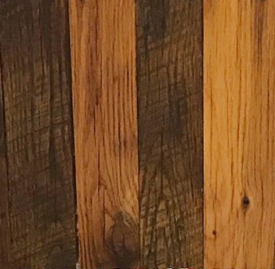 The saw marks from an old-style circular saw mill are well-preserved in this old-growth cabinet door.