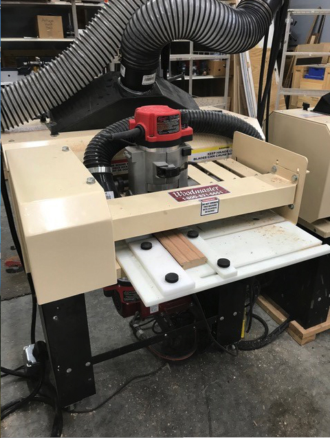 The Biglers put 3 Woodmasters to work. This one's set up with the 3-Side Molding attachment. It shapes 3 sides in 1 pass - tongue, groove, and back relief.